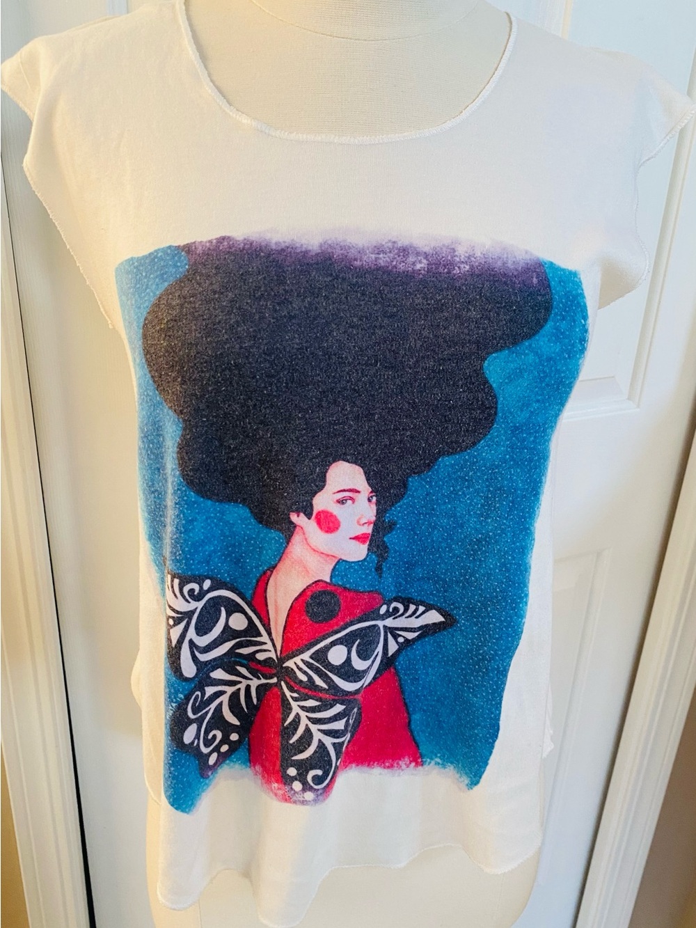 Graphic Butterfly Woman Sleeveless Tee in White, Blue, Red